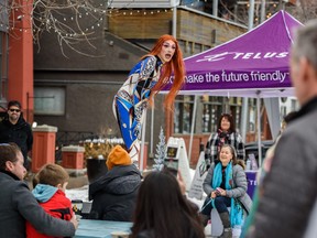 People gather outside the Trapped Escape Room to watch the Can't Stop The Love In Kensington drag queen show as part of the Chinook Blast winter festival on Sunday, February 5, 2023.