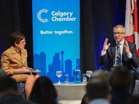 Calgary Chamber of Commerce CEO Deborah Yedlin and Alberta Finance Minister Travis Toews speak at an event hosted by the Calgary Chamber of Commerce on Thursday, March 2, 2023.