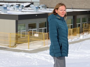 Rocky View Schools board chair Norma Lang was photographed outside W.H. Croxford High School in Airdrie where some portables have been added. The school division is hoping to get more funding for portables to meet a space shortage in schools.