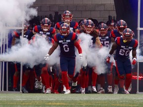 Players enter for the Eastern semifinal game between the Montreal Alouettes and Hamilton Tiger-Cats at Montreal's Percival Molson Memorial Stadium on Sunday, November 6, 2022. (Dave Sidaway / Montreal Gazette)