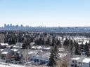 A view of the Calgary skyline with suburban houses in the foreground was photographed on Wednesday, March 22, 2023. 