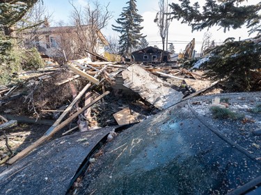 Debris scatters the site of the explosion in the northeast Calgary neighbourhood of Marlborough on March 30.