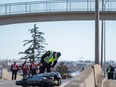 Calgary Police investigating at the scene of a fatal motorcycle accident on Macleod Trail by 31 Ave. S.W. on Friday, March 31.