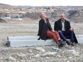 Carol Sheldon, a Vertos buyer, and the Ocgrow Group's president and CEO Harish Consul, explore the 150-acre piece of land that will feature multi-family residences, plazas and cool restaurants and shops.