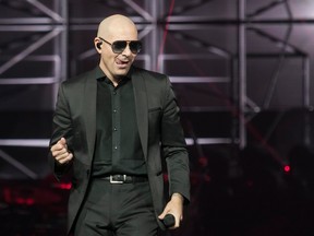Performer Pitbull performs at the Bell Centre in Montreal on Monday, Oct. 9, 2017.