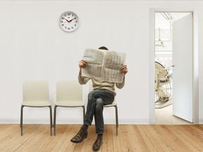 Person sitting in doctor office hospital waiting room clock long patient medical stock photo getty images