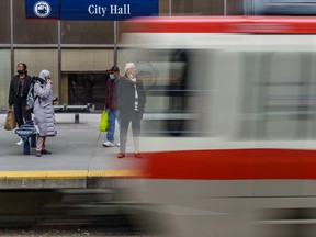 A train pulls in to stop at City Hall station in downtown Calgary on Wednesday, March 23, 2022. Data from Calgary transit shows ridership is on track to rebound to pre-pandemic levels sometime this year.