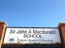 The exterior of Sir John A. Macdonald Junior High School is shown in Calgary on Monday, March 20, 2023.