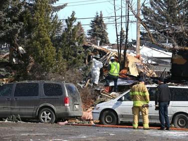 Investigators are shown at the scene of an explosion on Maryvale Way NE in Calgary on Monday, March 27, 2023.