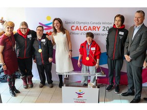 Special Olympics athletes pose with Calgary Mayor Jyoti Gondek and co-chairs Cheryl Bernard and François Poirier during the official announcement that the Special Olympics Canada Winter Games Calgary 2024 will be held in Calgary.  Gavin Young/Postmedia