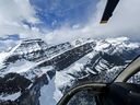 A birds-eye view of the snow-capped peaks of the Canadian Rockies near the Columbia Icefield outside Jasper Alberta, from a Rockies Heli Tours copter. 