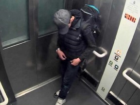 In this file photo taken May 22, 2017, and released by the Manchester Arena Inquiry in Manchester, England, on Sept. 8, 2020, shows suicide bomber Salman Abedi carrying a rucksack in the elevator at Victoria Station in Manchester.