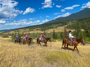 An image of a trail ride at Big Bar Guest Ranch in British Columbia, Canada.