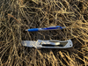 ASIRT says a knife was found at the scene of a police shooting in Wheatland County on Feb. 12, 2023, after a driver ran at an RCMP officer with an item in their hand (pen included for scale).