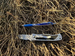 ASIRT says a knife was found at the scene of a police shooting in Wheatland County on February 12, 2023 after a driver ran up to an RCMP officer with an item in their hand (pen included for scale).