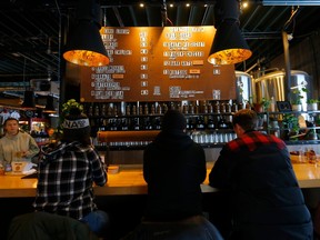 Patrons at the Ol' Beautiful Brewing Co. will spend more money as beer prices rise across Calgary.