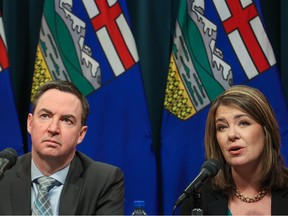 Health Minister Jason Copping and Premier Danielle Smith provide updates on the work underway to reduce wait times and improve patient care in Alberta during a press conference at the McDougall Centre in Calgary on Monday, Feb. 27, 2023.