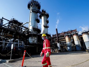 A Shell employee walks past the company's new Quest Carbon Capture and Storage facility in Fort Saskatchewan