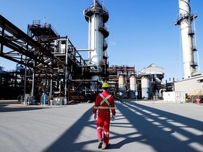 A Shell employee walks through the company's Quest Carbon Capture and Storage facility in Fort Saskatchewan, Alberta. The federal budget promises tens of billions to speed the transition to a net-zero emissions economy.
