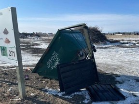 A garbage bin at the Town of Claresholm's compost site, which RCMP say was "blown up" by a pipe bomb on March 4, 2023.
