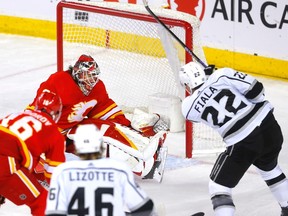 Calgary Flames goaltender Jacob Markstrom stops Los Angeles Kings forward Kevin Fiala in third-period action at the Scotiabank Saddledome in Calgary on Tuesday, March 28, 2023.
