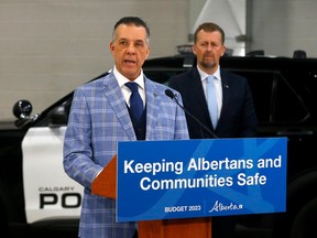 Jason Bobrowich, Inspector, Alberta Law Enforcement Response Teams speaks as Mike Ellis, Minister of Public Safety and Emergency Services announced details of new initiatives to help tackle gang and illegal gun violence.