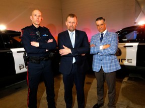 L-R, Cory Dayley, Acting Deputy Chief, Calgary Police Service, Mike Ellis, Minister of Public Safety and Emergency Services and Jason Bobrowich, Inspector, Alberta Law Enforcement Response Teams were on hand as Ellis announced details of new initiatives to help tackle gang and illegal gun violence affecting communities across touch the province in Calgary on Wednesday March 8, 2023.