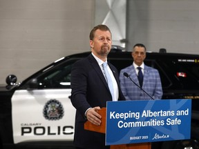 Public Safety and Emergency Services Minister Mike Ellis speaks at a press conference in Calgary on Wednesday.
