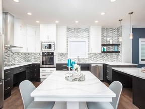 This kitchen by Distinct Interior Designs contains elements to make it wheelchair accessible.