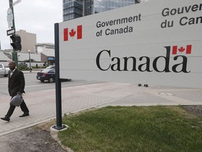 Razak Iyal, one of two asylum seekers who walked across the Canada/US border in December and lost his fingers because of severe frostbite, is photographed as he enters his refugee hearing in Winnipeg, Tuesday, June 13, 2017.