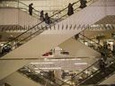 Shoppers take the escalators in search of Boxing Day deals at a Nordstrom store in downtown Toronto, December 26, 2017.