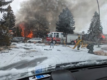 Emergency crews respond to a home explosion and fire on the 700 block of Maryvale Way N.E. in Calgary on Monday, March 27, 2023.