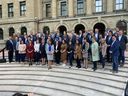 Premier Danielle Smith poses with the Alberta UCP Caucus at the McDougall Center in Calgary on October 7, 2022.
