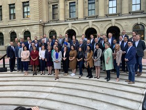 Premier Danielle Smith poses with the Alberta UCP caucus at the McDougall Centre in Calgary on Oct. 7, 2022.