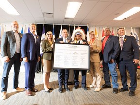 Dignitaries gather after Enbridge and 23 First Nations and Metis communities signed the largest Indigenous energy investment in Canadian history in September 2022.