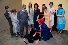 Miss Marple (Alana Gowdy kneeling) investigates a murder as the prime suspects gather around in Workshop Theatre’s A Murder is Announced. Courtesy, Sharon Olsen