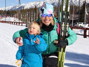 Olympic cross-country skiing gold medalist Chandra Crawford and her son Wesley, 1, at the Canmore Nordic Centre on Friday, March 31, 2023.