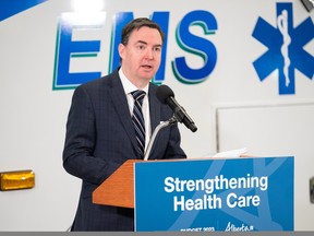 Alberta Health Minister Jason Copping speaks at a press conference announcing additional support to lower EMS response times at the StoneGate EMS station in Calgary on April 3.