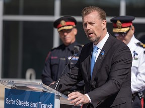 Mike Ellis, Minister of Public Safety and Emergency Services, speaks during a press conference in Calgary on Tuesday, April 4, 2023.