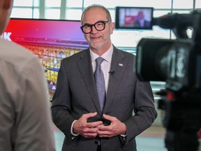 Bob Sartor with the Calgary Airport Authority speaks with media at the Calgary International Airport on Wednesday, April 26, 2023.