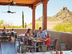 Family dining at Proof. Courtesy, Four Seasons Resort Scottsdale