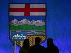 Visitors wait for results at the BMO Centre in Calgary for the UCP leadership vote on Thursday, October 6, 2022.