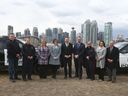 Dignitaries pose in Calgary on Friday, April 14, 2023. The provincial government has announced funding to help people struggling with addiction and mental health access much-needed support. 