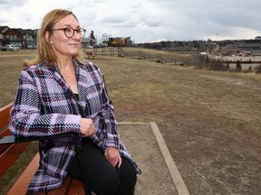 Kathy Christiansen, executive director of Calgary Alpha House Society, poses following a press conference in Calgary on Friday, April 14.
