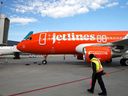 A Canada Jetlines Airbus A320 jet pulls up to the Calgary airport gate on the airline's inaugural flight at Calgary, Alta., Thursday, Sept. 22, 2022. 