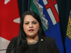 Rajan Sawhney, Minister of Trade, Immigration and Multiculturalism, speaks during a press conference at the McDougall Center in Calgary on Monday, April 3, 2023.