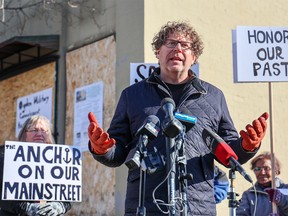 Councilman Gian-Carlo Carra speaks to media outside the historic building at 7044 Ogden Road that the Millican Ogden Heritage Group is trying to save from demolition on Wednesday, April 5, 2023. Carra hopes to help the group prevent the building's demolition as part of construction for the Green Line.