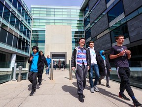 Charter school students leave the Smart Technologies building on Wednesday, April 19, 2023 after an announcement that the building will soon become a hub school for several charter schools in the city following a recent purchase by the province.
Gavin Young/Postmedia