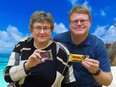 Crystal Regehr-Westergard and husband Bert with two of their recreated chocolate bars.