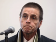 FILE: Hassan Diab speaks with reporters in Ottawa on Jan. 17, 2018.